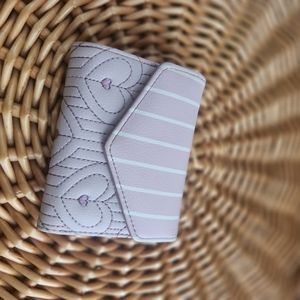 Betsy Johnson Wallet in a pink /lavendar color small sized carries plenty